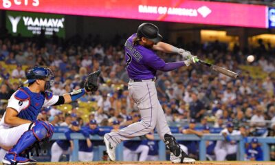 Brendan Rodgers hits a home run for the Colorado Rockies on the road against the Los Angeles Dodgers.